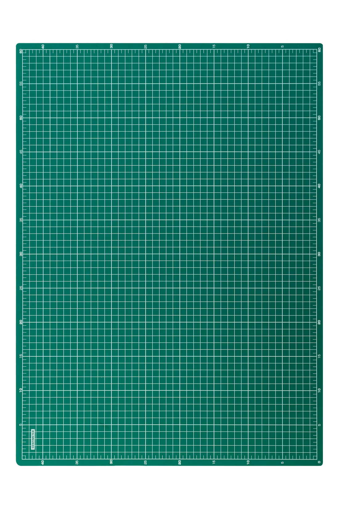 Green desk mat with white grid and rulers